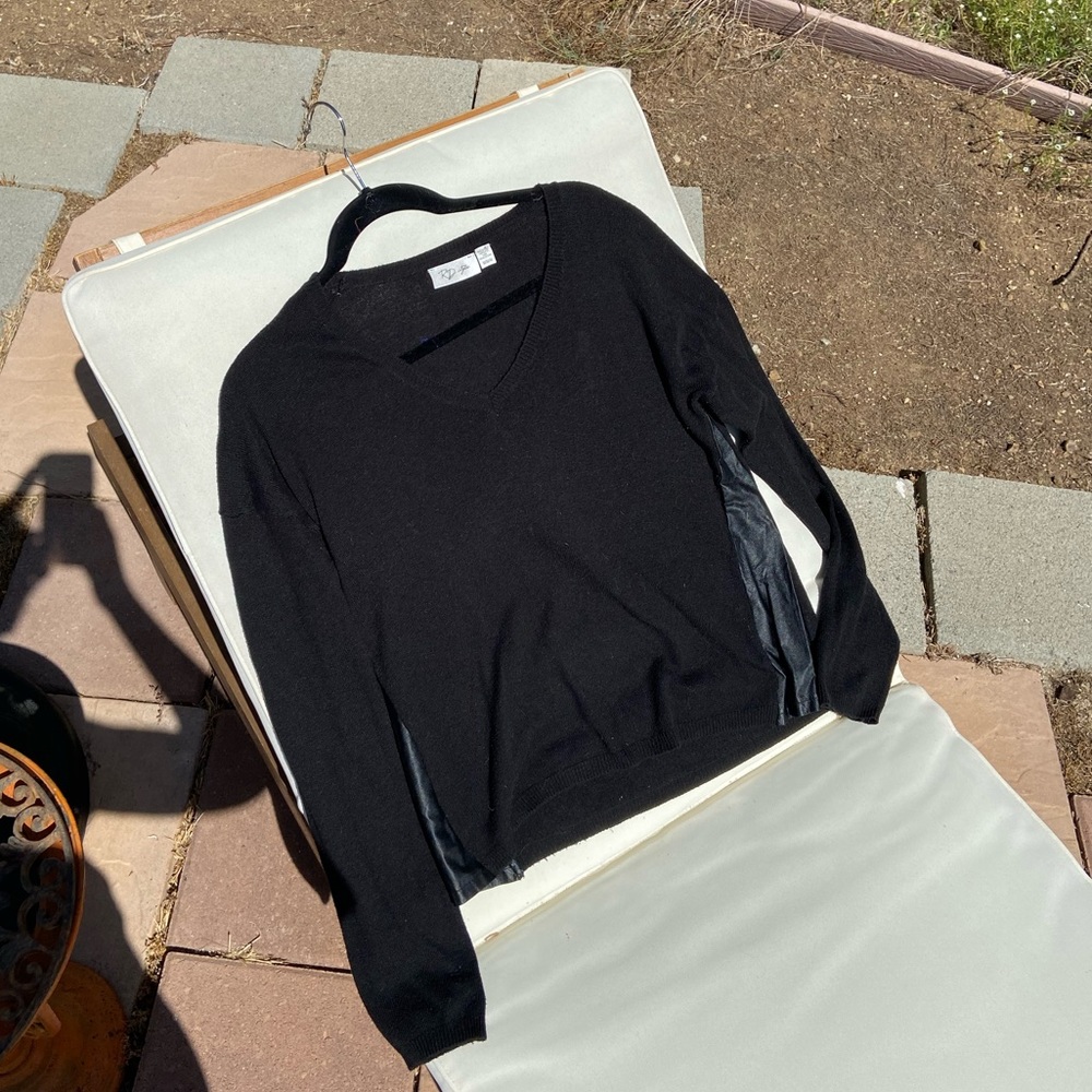 Black sweater with pleather details